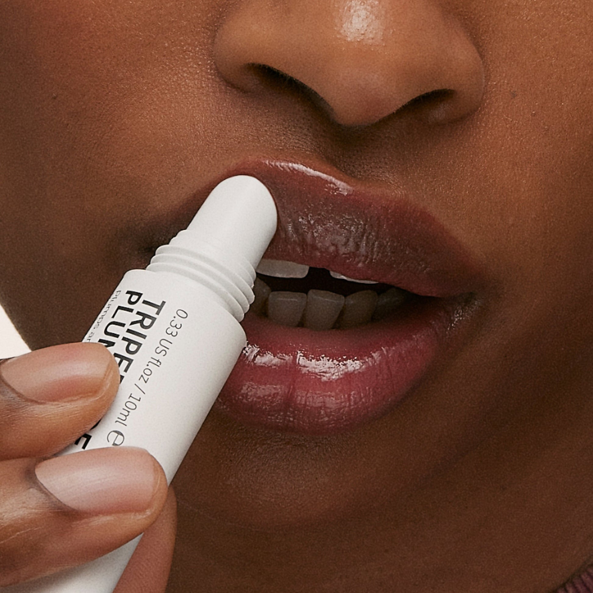 tripeptide-plumping-berry-lip-balm-u4 ApplicationBerry.jpg